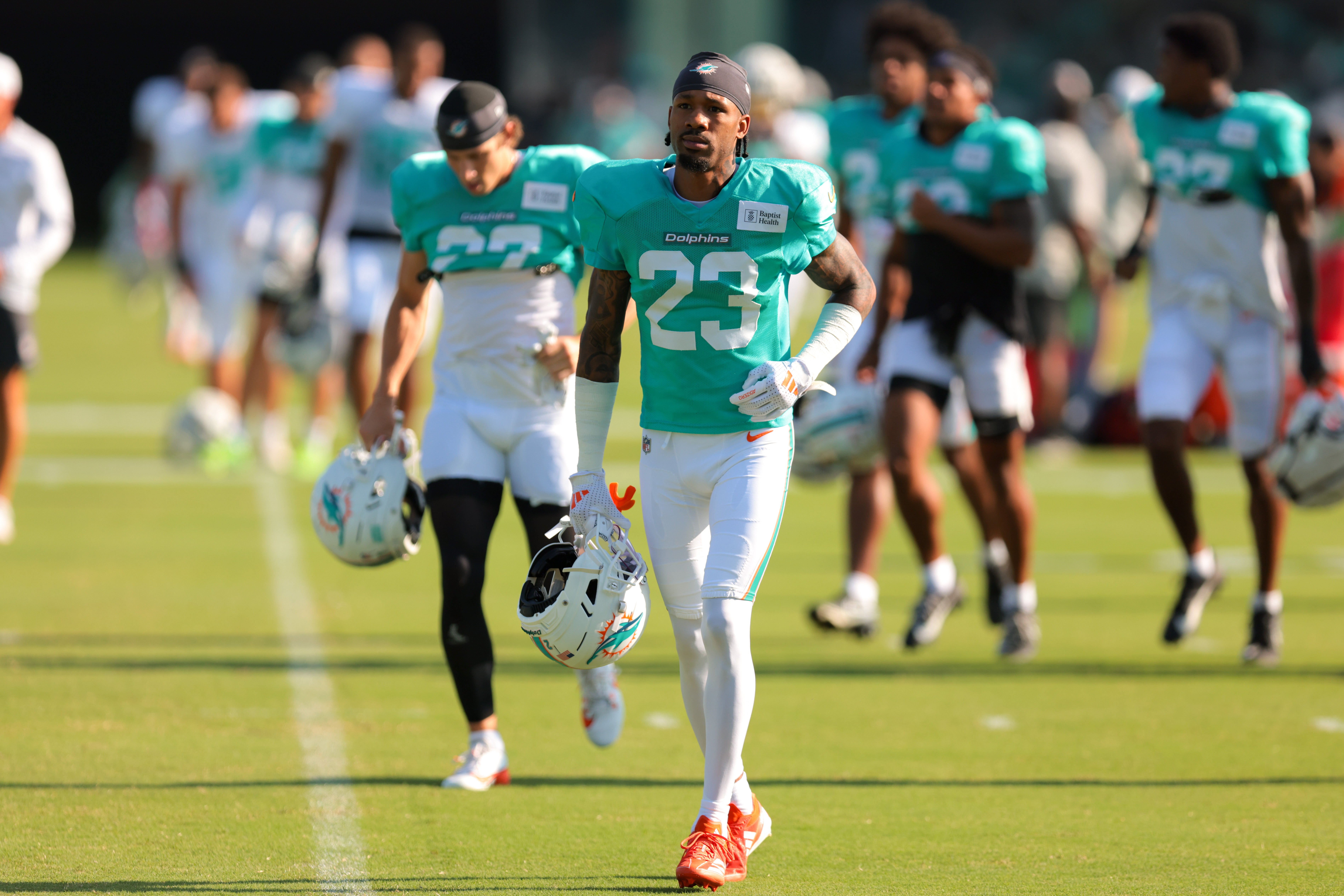 Jul 29, 2025; Miami Gardens, FL, USA; Miami Dolphins cornerback Jack Jones (23) runs on the field during training camp at Baptist Health Training Complex. 