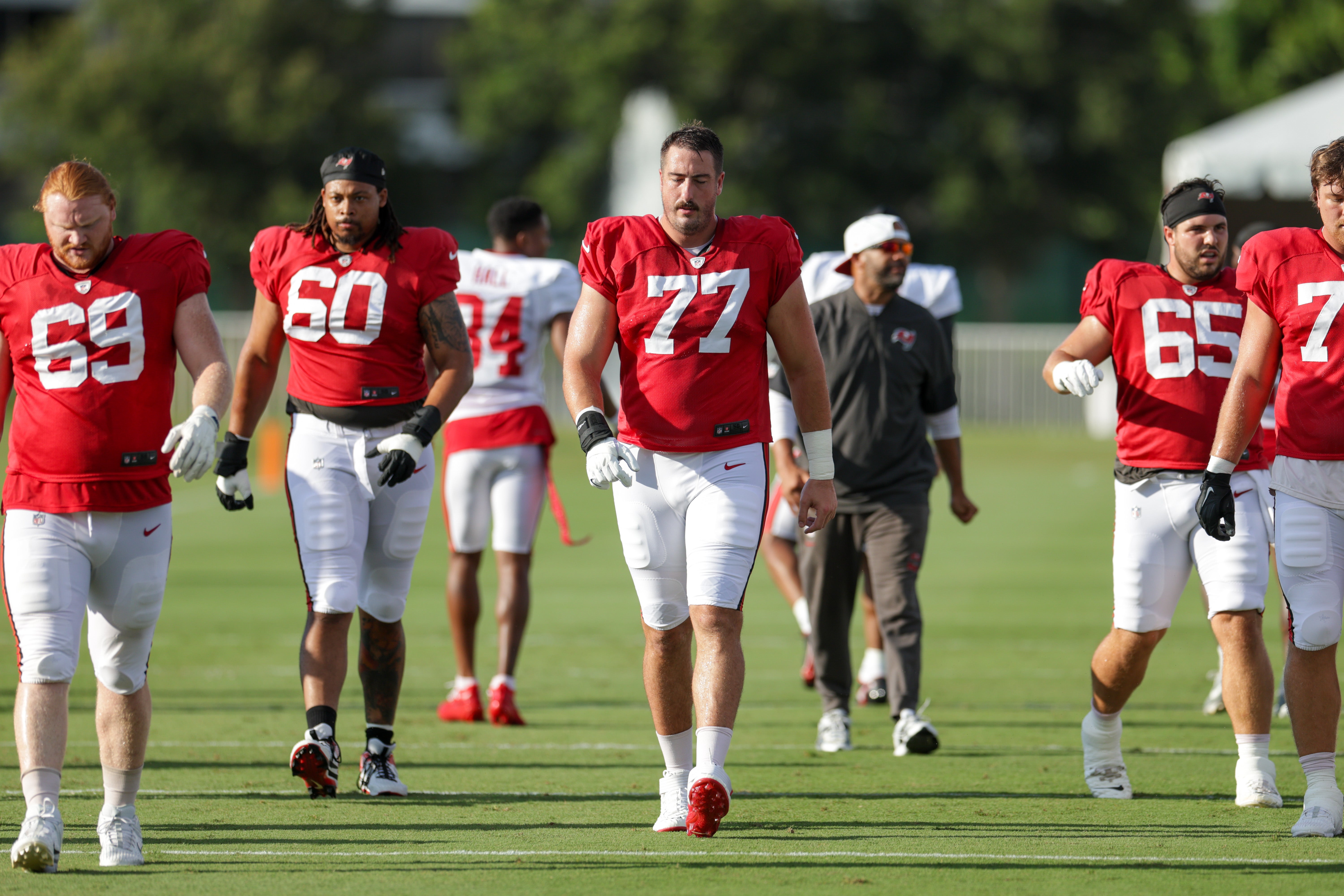 Jul 31, 2025; Tampa, FL, USA; Tampa Bay Buccaneers offensive tackle Charlie Heck (77) participates in training camp at AdventHealth Training Center. 