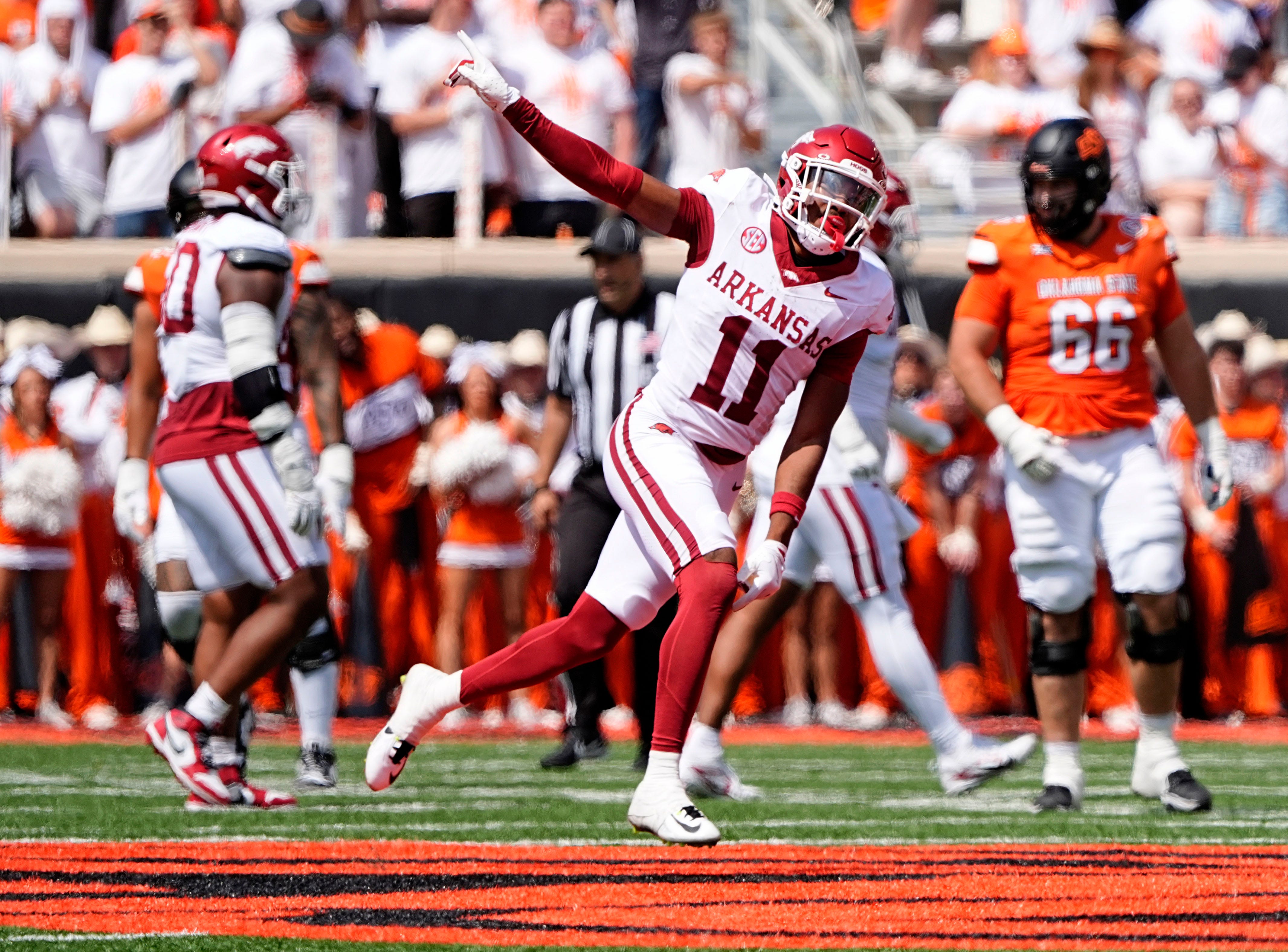 Arkansas' Jaylon Braxton (11) celebrates a defensive play in the first half of the college football game between the Oklahoma State Cowboys and the Arkansas Razorbacks at Boone Pickens Stadium in Stillwater, Okla.,, Saturday, Sept., 7, 2024.