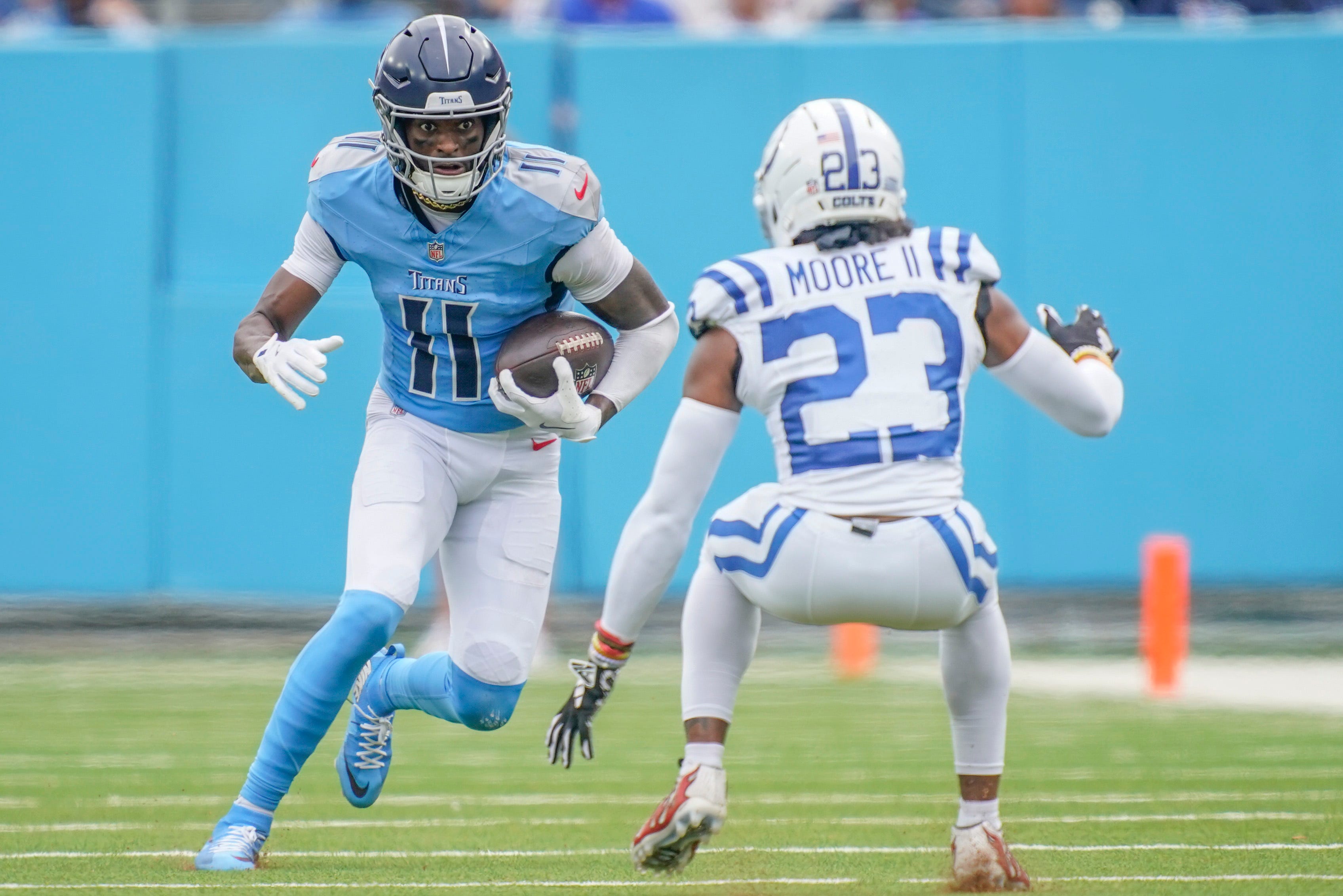 Colts CB Kenny Moore attempts to cover Titans WR