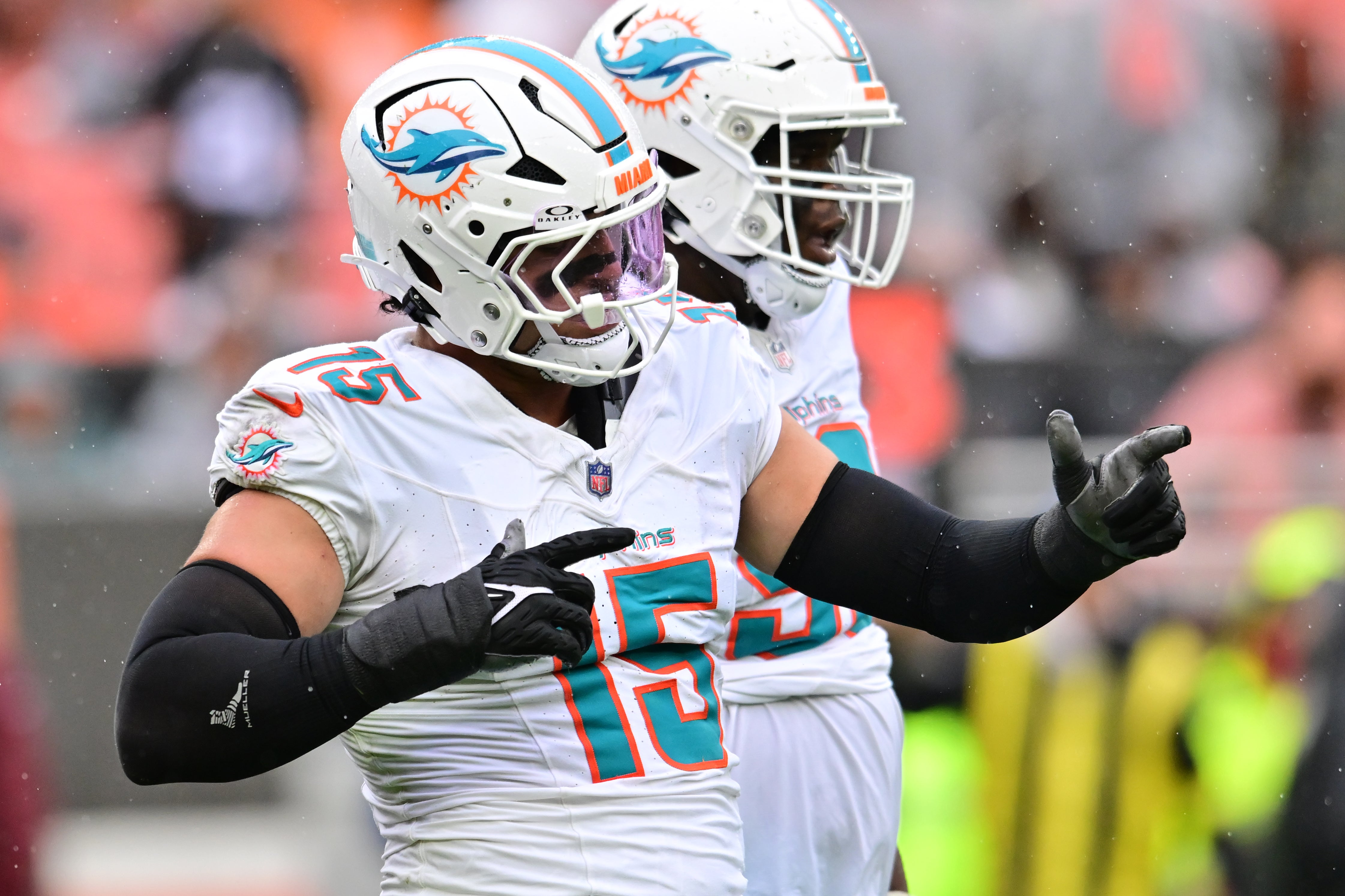 Miami Dolphins linebacker Jaelan Phillips (15) celebrates after a tackle during the first half against the Cleveland Browns at Huntington Bank Field.