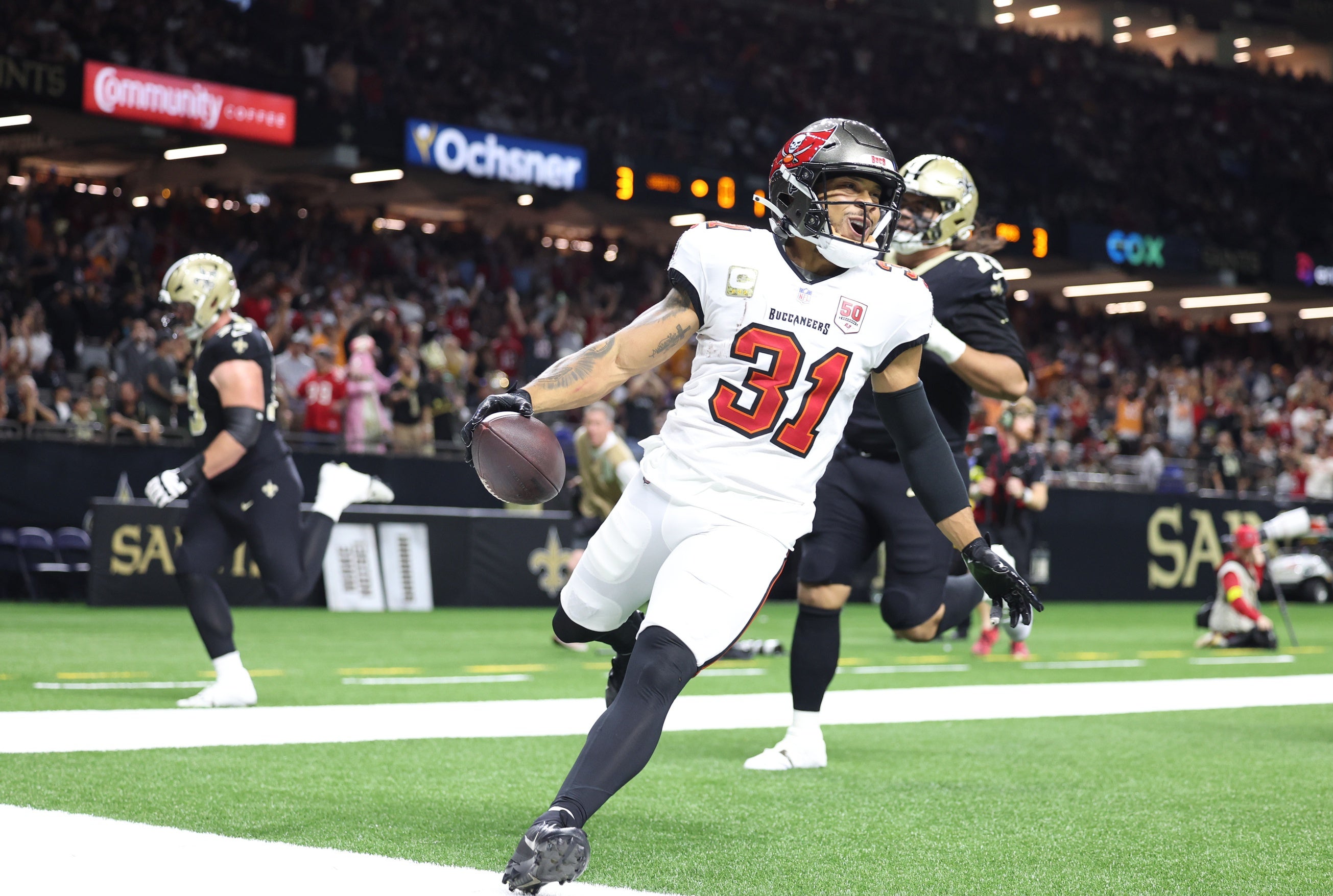Oct 26, 2025; New Orleans, Louisiana, USA; Tampa Bay Buccaneers safety Antoine Winfield Jr. (31) reacts after a touchdown during the second quarter against the New Orleans Saints at Caesars Superdome.