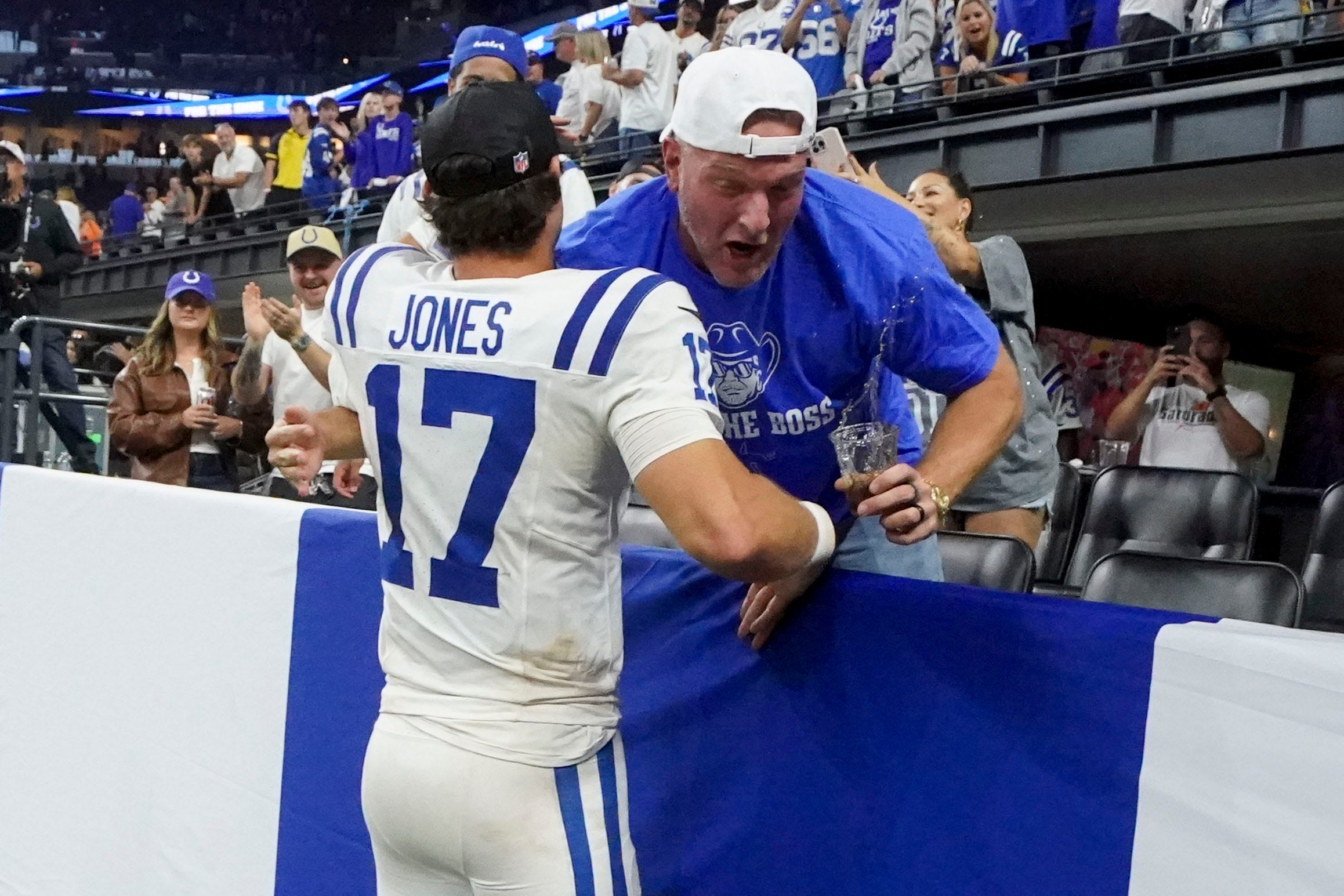 Colts QB Daniel Jones hugs Colts legend Pat McAfee
