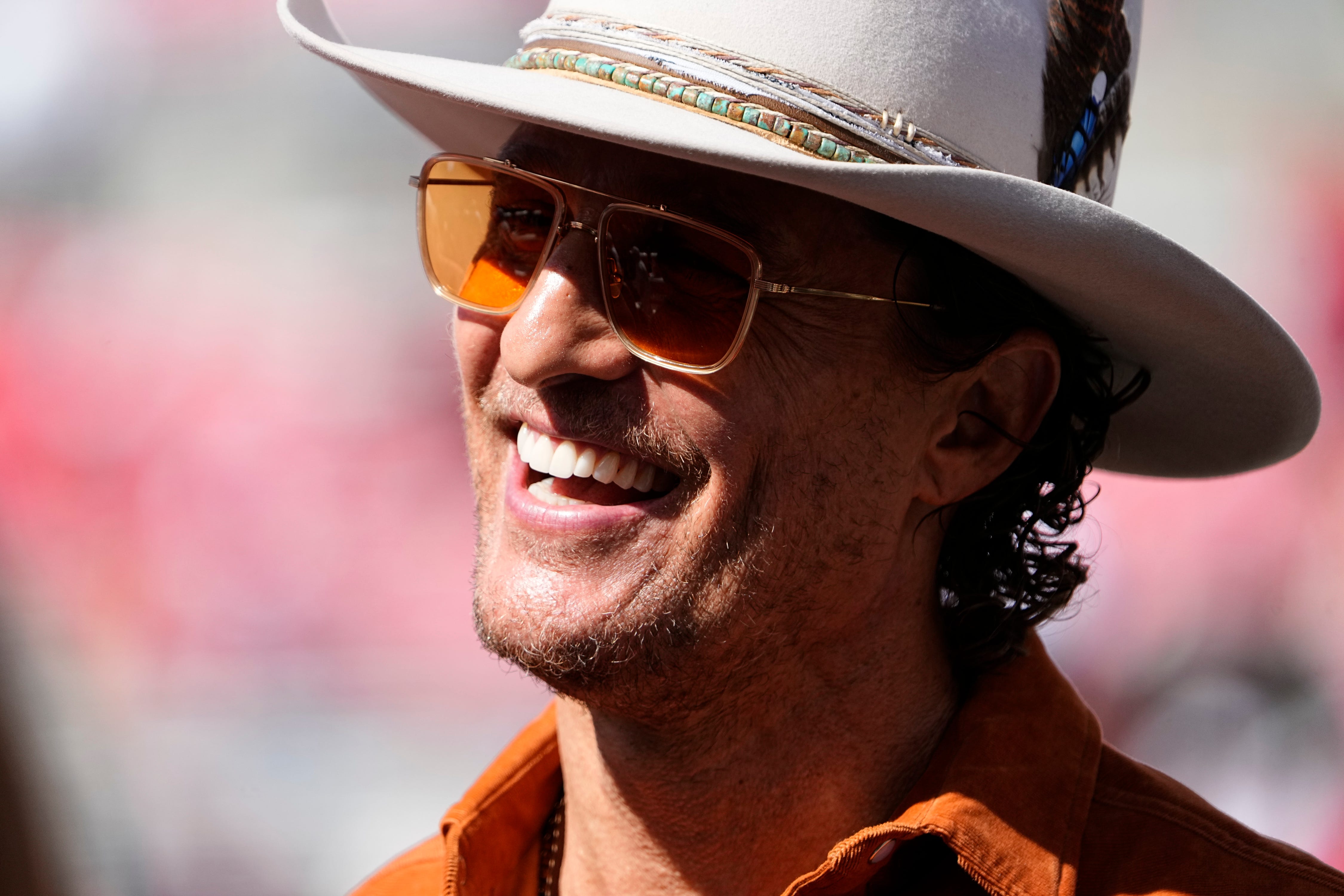 Actor Matthew McConaughey on the sideline at a Texas Longhorns football game