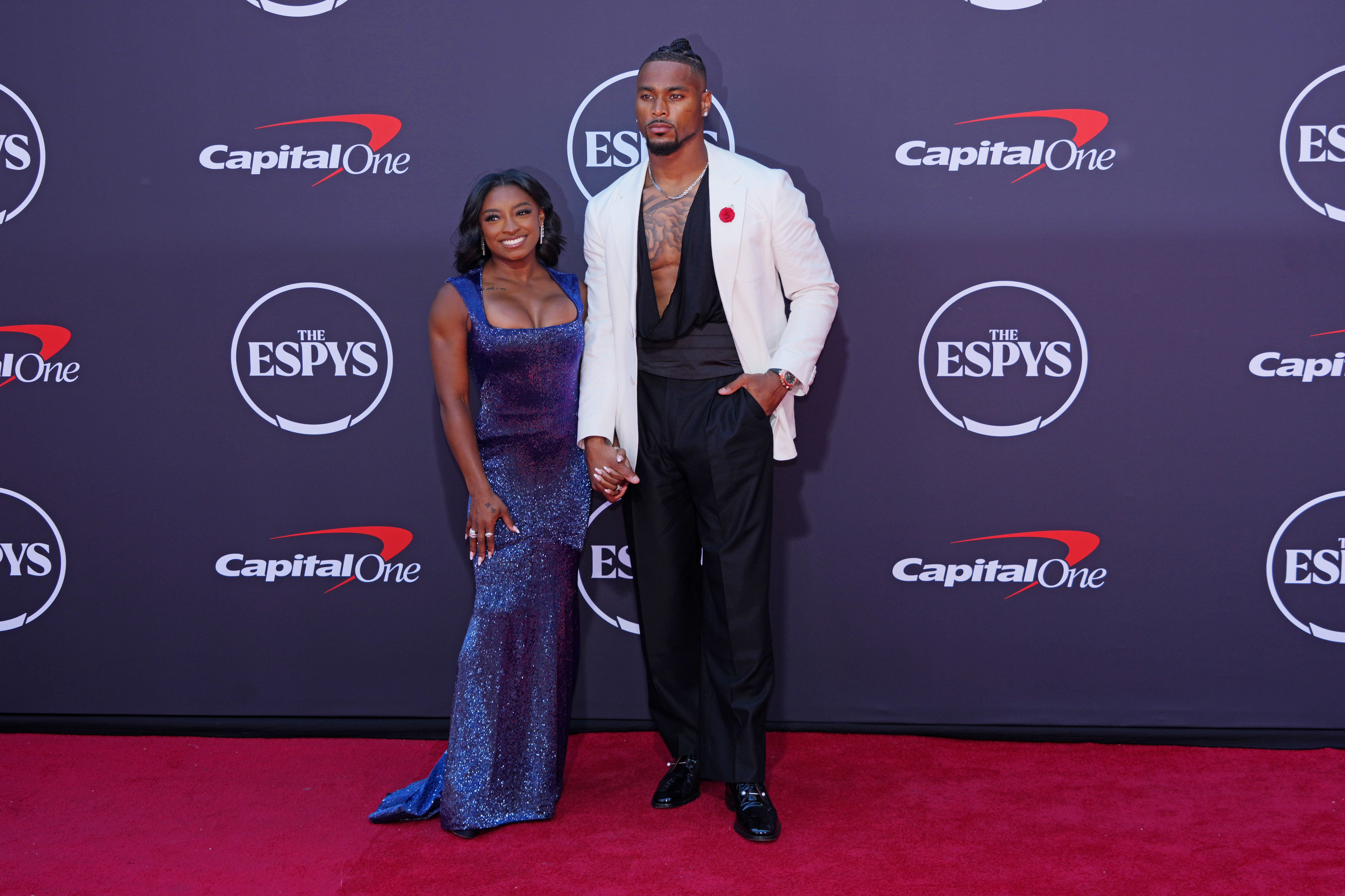 NFL safety Jonathan Owens and USA Olympic legend Simone Biles