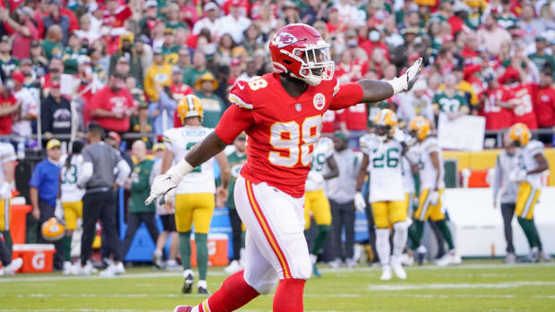 Kansas City Chiefs defensive tackle Chris Jones urges the crowd to cheer  during the first half of the NFL AFC championship football game against the  Buffalo Bills, Sunday, Jan. 24, 2021, in