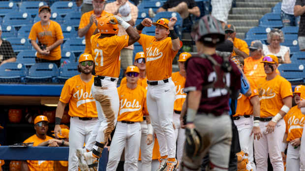May 23, 2024; Hoover, AL, USA; Tennessee Volunteers outfielder Kavares Tears (21) celebrates his three-run home run with teammates during a game against the Texas A&M Aggies at the SEC Baseball Tournament at Hoover Metropolitan Stadium.