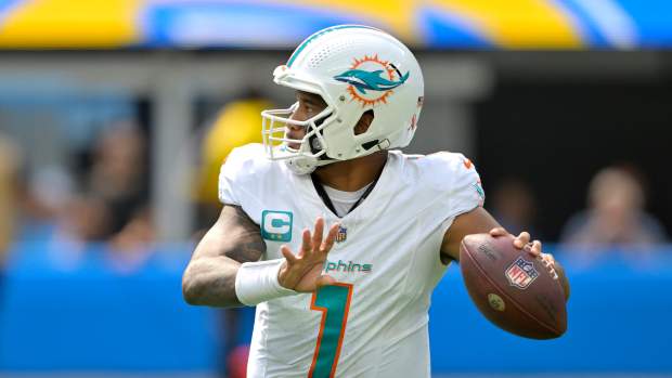 Sep 10, 2023; Inglewood, California, USA; Miami Dolphins quarterback Tua Tagovailoa (1) sets to pass in the first half against the Los Angeles Chargers at SoFi Stadium.