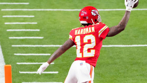 Feb 11, 2024; Paradise, Nevada, USA; Kansas City Chiefs wide receiver Mecole Hardman Jr. (12) scores the winning touchdown against the San Francisco 49ers during overtime in Super Bowl LVIII at Allegiant Stadium.