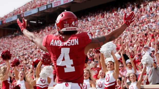 Oklahoma's Nic Anderson (4) celebrates a touchdown in the first half of the college football game between the University of Oklahoma Sooners and the University of Central Florida Knights at Gaylord Family Oklahoma-Memorial Stadium in Norman, Okla., Saturday, Oct., 21, 2023.