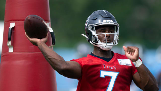 Tennessee Titans wide receiver Colton Dowell (14) carries against