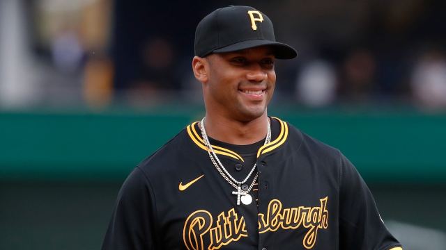 Apr 19, 2024; Pittsburgh, Pennsylvania, USA; Pittsburgh Steelers quarterback Russell Wilson (3) throws out a ceremonial first pitch before the Pittsburgh Pirates host the Boston Red Sox at PNC Park. Mandatory Credit: Charles LeClaire-USA TODAY Sports  