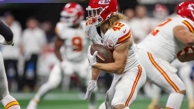 Sep 22, 2024; Atlanta, Georgia, USA; Kansas City Chiefs running back Samaje Perine (34) is tackled by Atlanta Falcons linebacker Troy Andersen (44) in the second quarter at Mercedes-Benz Stadium.