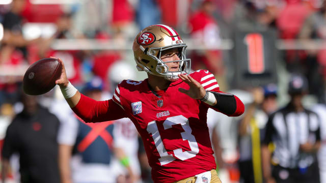 San Francisco 49ers quarterback Brock Purdy (13) throws in the fourth  quarter during an NFL divisional round playoff football game against the  Dallas Cowboys, Sunday, Jan. 22, 2023, in Santa Clara, Calif. (