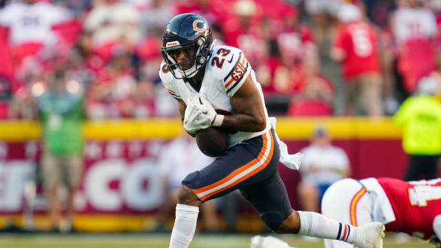 Khari Blasingame of the Chicago Bears runs a drill during the