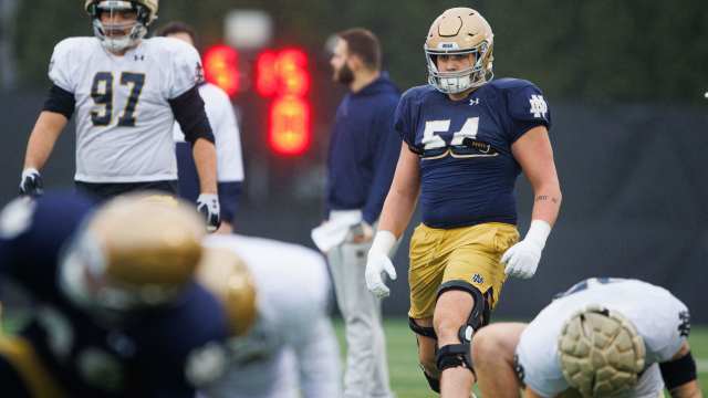 Notre Dame offensive lineman Anthonie Knapp (54) warms up during a Notre Dame football practice at Irish Athletic Center on Monday, Dec. 16, 2024, in South Bend.