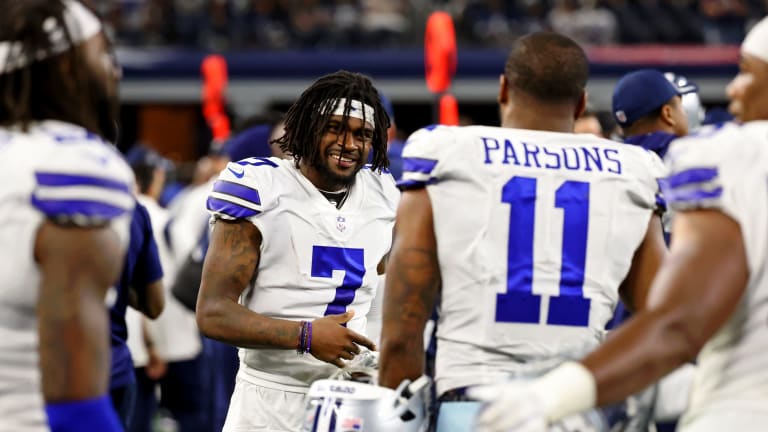 Dallas Cowboys cornerback Trevon Diggs (7) celebrates intercepting