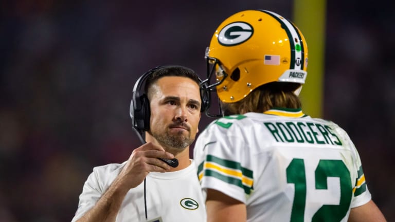 Aaron Rodgers shows off his new Matt LaFleur t-shirt