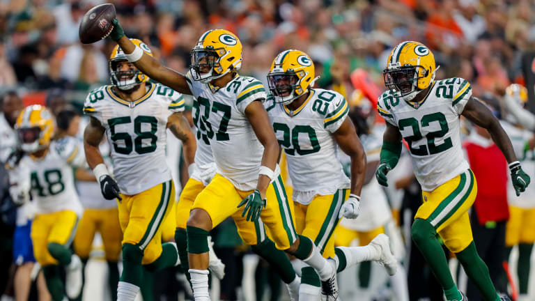 Emanuel Wilson of the Green Bay Packers rushes the ball against