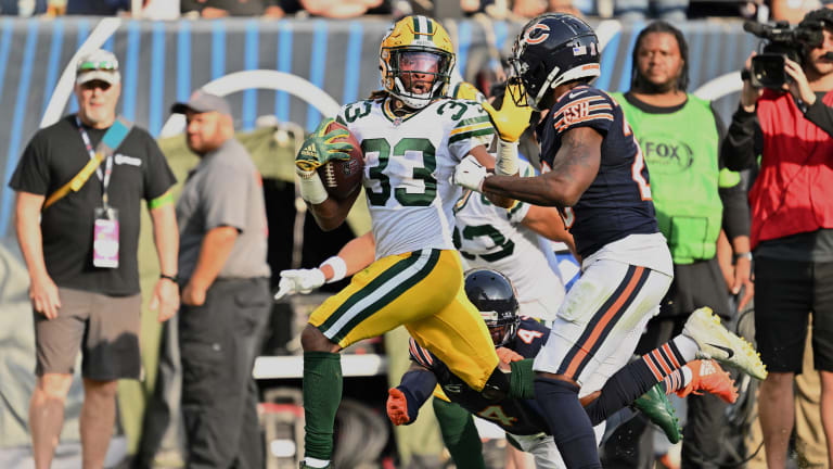 Aaron Jones of the Green Bay Packers runs with the ball in the