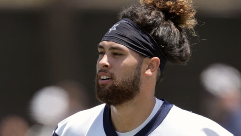 Dallas Cowboys wide receiver Simi Fehoko (81) smiles as he enters the field  before a preseason NFL football game against the Los Angeles Chargers  Saturday, Aug. 20, 2022, in Inglewood, Calif. (AP