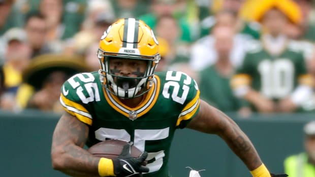 October 2, 2022: Green Bay Packers wide receiver Christian Watson (9)  warming up before the NFL football game between the New England Patriots  and the Green Bay Packers at Lambeau Field in