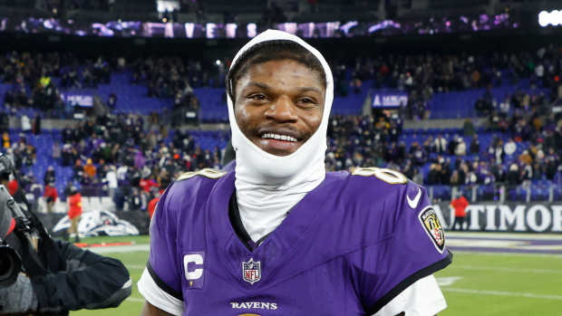 Jan 11, 2025; Baltimore, Maryland, USA; Baltimore Ravens quarterback Lamar Jackson (8) celebrates after defeating the Pittsburgh Steelers in an AFC wild card game at M&T Bank Stadium.
