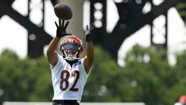 Jun 10, 2025; Cincinnati, OH, USA; Cincinnati Bengals wide receiver Mitchell Tinsley (82) completes a catch during practice at Paycor Stadium.