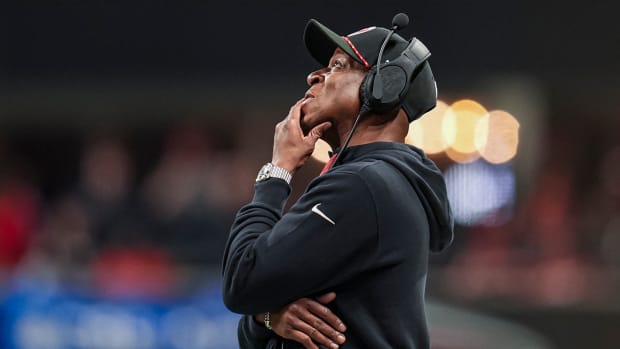 Jan 5, 2025; Atlanta, Georgia, USA; Atlanta Falcons head coach Raheem Morris reacts on the sidelines against the Carolina Panthers during the second half at Mercedes-Benz Stadium.