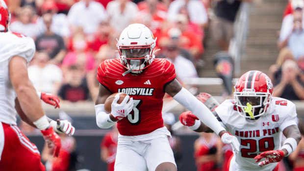 Louisville Cardinals defensive back Quincy Riley (3) runs the ball down the field during their game against the Austin Peay Governors on Saturday, Aug. 31, 2024 at L&N Federal Credit Union Stadium in Louisville, Ky.