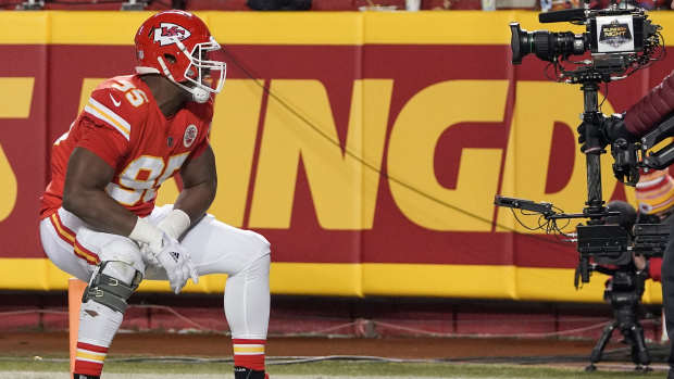 Jan 16, 2022; Kansas City, Missouri, USA; Kansas City Chiefs defensive end Chris Jones (95) celebrates toward the camera after a play against the Pittsburgh Steelers in an AFC Wild Card playoff football game at GEHA Field at Arrowhead Stadium.