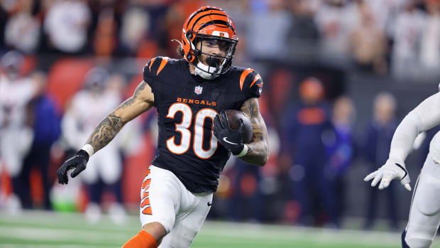 Dec 28, 2024; Cincinnati, Ohio, USA; Cincinnati Bengals running back Chase Brown (30) runs the ball during the fourth quarter against the Denver Broncos at Paycor Stadium.