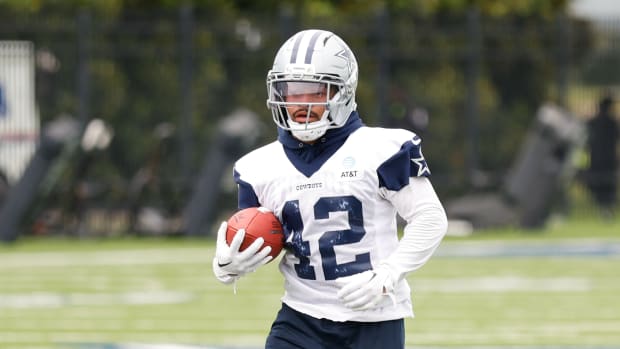 Dallas Cowboys running back Deuce Vaughn (42) goes through a drill during practice at the Ford Center at the Star Training Facility in Frisco, Texas.