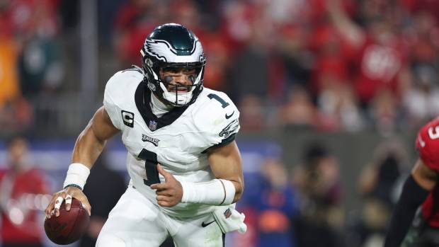 Philadelphia Eagles quarterback Jalen Hurts (1) runs with the ball during the second half of a 2024 NFC wild card game against the Tampa Bay Buccaneers at Raymond James Stadium.