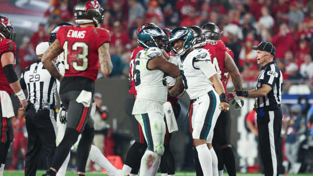 Philadelphia Eagles defensive end Brandon Graham (55) and linebacker Nolan Smith (3) celebrate a sack on Tampa Bay Buccaneers quarterback Baker Mayfield (6) during the second half of a 2024.