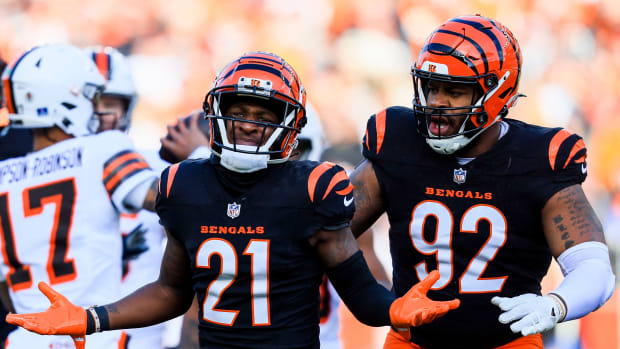 Dec 22, 2024; Cincinnati, Ohio, USA; Cincinnati Bengals cornerback Mike Hilton (21) reacts after sacking Cleveland Browns quarterback Dorian Thompson-Robinson (17) in the first half at Paycor Stadium.