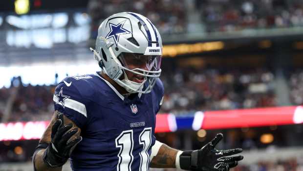 Dallas Cowboys linebacker Micah Parsons (11) celebrates after a sack during the first quarter against the Washington Commanders at AT&T Stadium.