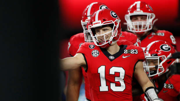Georgia quarterback Stetson Bennett (13) celebrates after scoring a touchdown during the first half of the NCAA College Football National Championship game between TCU and Georgia on Monday, Jan. 9, 2023, in Inglewood, Calif.