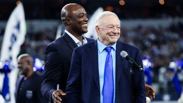 Dallas Cowboys owner Jerry Jones introduces former player Demarcus Ware into the Ring of Honor during halftime of the game against the Los Angeles Rams at AT&T Stadium.