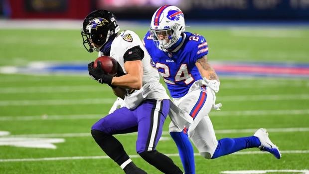 Buffalo Bills cornerback Taron Johnson (24) defends against Baltimore Ravens wide receiver Willie Snead (83) during the fourth quarter of an AFC Divisional Round game at Bills Stadium.