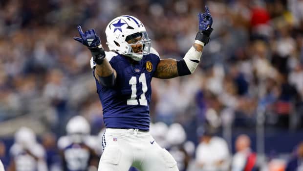 Dallas Cowboys linebacker Micah Parsons (11) celebrates after a sack during the third quarter against the New York Giants at AT&T Stadium.