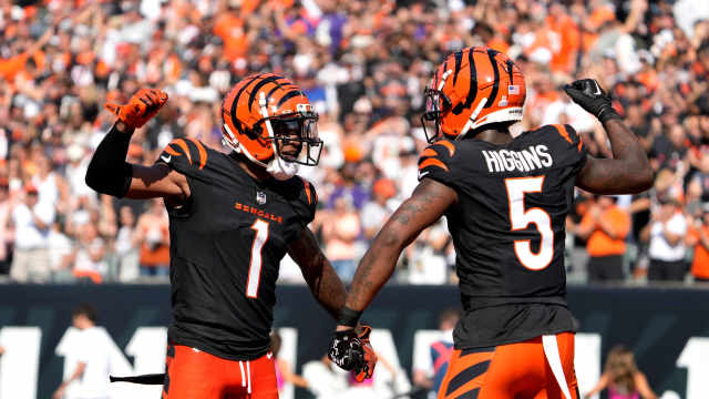 Cincinnati Bengals wide receiver Ja'Marr Chase (1) and wide receiver Tee Higgins (5) celebrate Higgins touchdown in the 3rd quarter over the Baltimore Ravens on Sunday, October 6, 2024, at Payor Stadium.