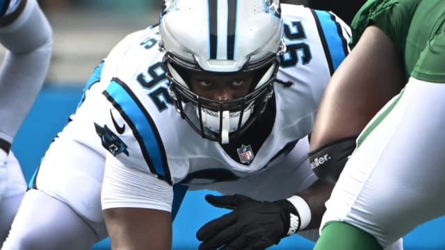 Carolina Panthers defensive tackle Derrick Brown (95) encourages the crowd  to get loud during an NFL football game against the Atlanta Falcons,  Thursday, Nov. 10 2022, in Charlotte, N.C. (AP Photo/Brian Westerholt