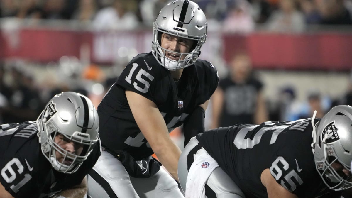 Las Vegas Raiders quarterback Chase Garbers (14) prepares to throw