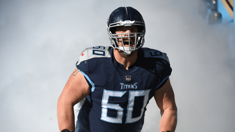 Tennessee Titans center Ben Jones (60) runs onto the field before