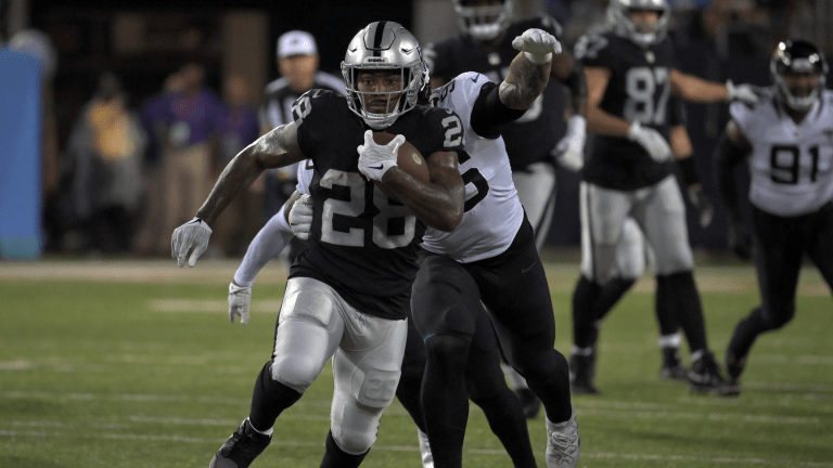 Oakland Raiders running back Josh Jacobs (28) celebrates after