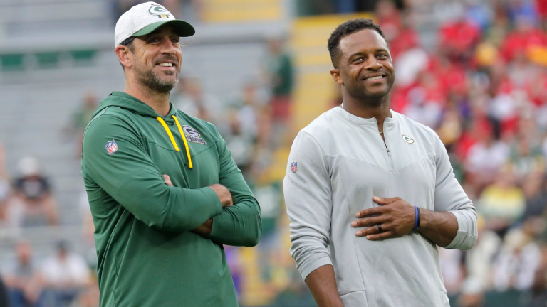 The year is 2053. Aaron Rodgers, now 69, looks fondly up at the Lambeau  crowd, all 80,000+ cheering wildly as the 12 is unveiled in the north  endzone and Aaron Rodgers becomes