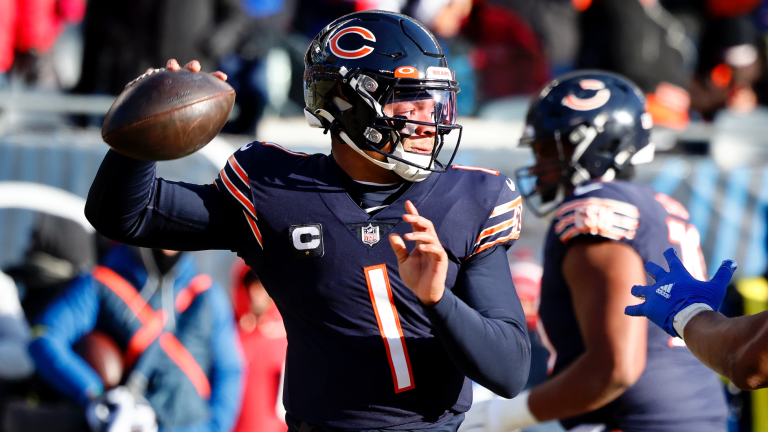 Justin Fields of the Chicago Bears reacts after a play during the