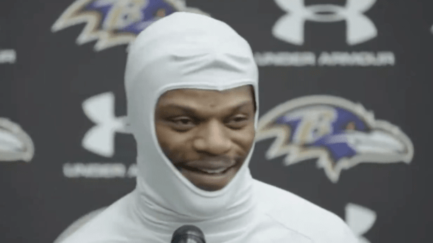 Baltimore Ravens quarterback Lamar Jackson talks to reporters on December 23, 2024.