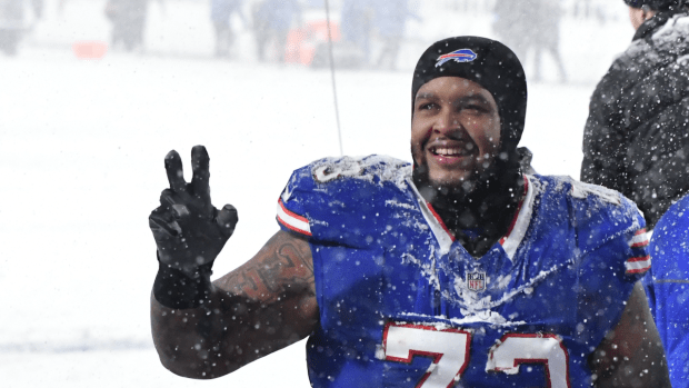 Dec 1, 2024; Orchard Park, New York, USA; Buffalo Bills offensive tackle Dion Dawkins (73) leaves the field after winning a game against the San Francisco 49ers to clinch the AFC East title at Highmark Stadium. 